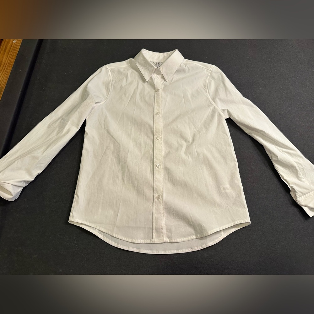 Classic White Womens Shirt. 100% polyester. Stretchy
